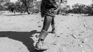 feet walking through the desert