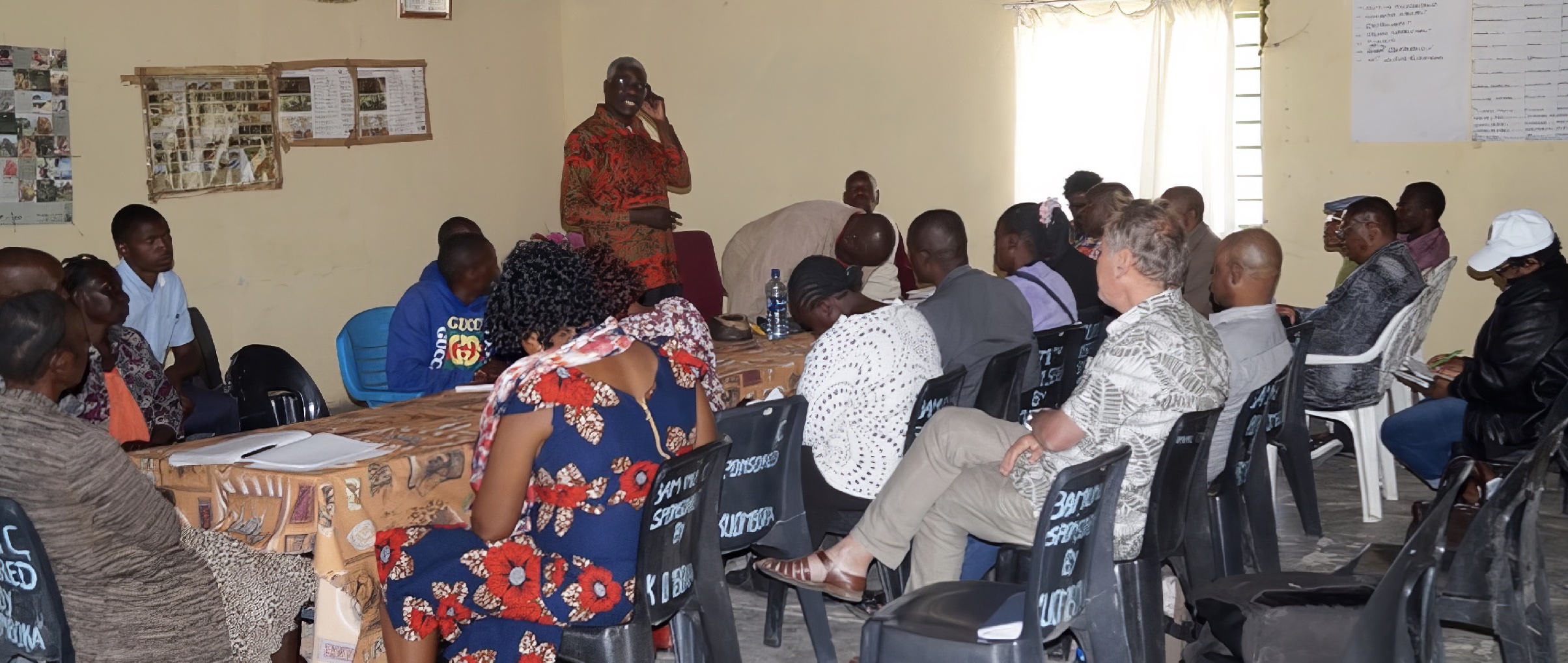 A group of people at a meeting.
