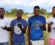Four young drone operators with their tech.