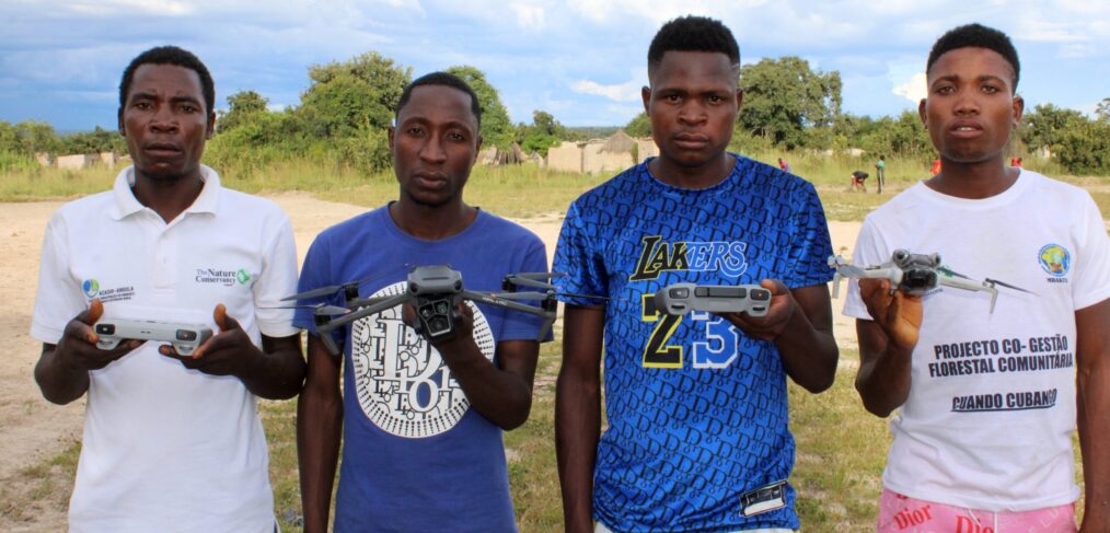 Four young drone operators with their tech.