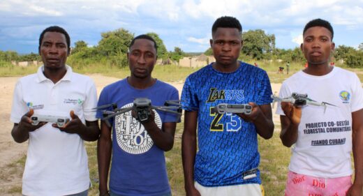 Four young drone operators with their tech.